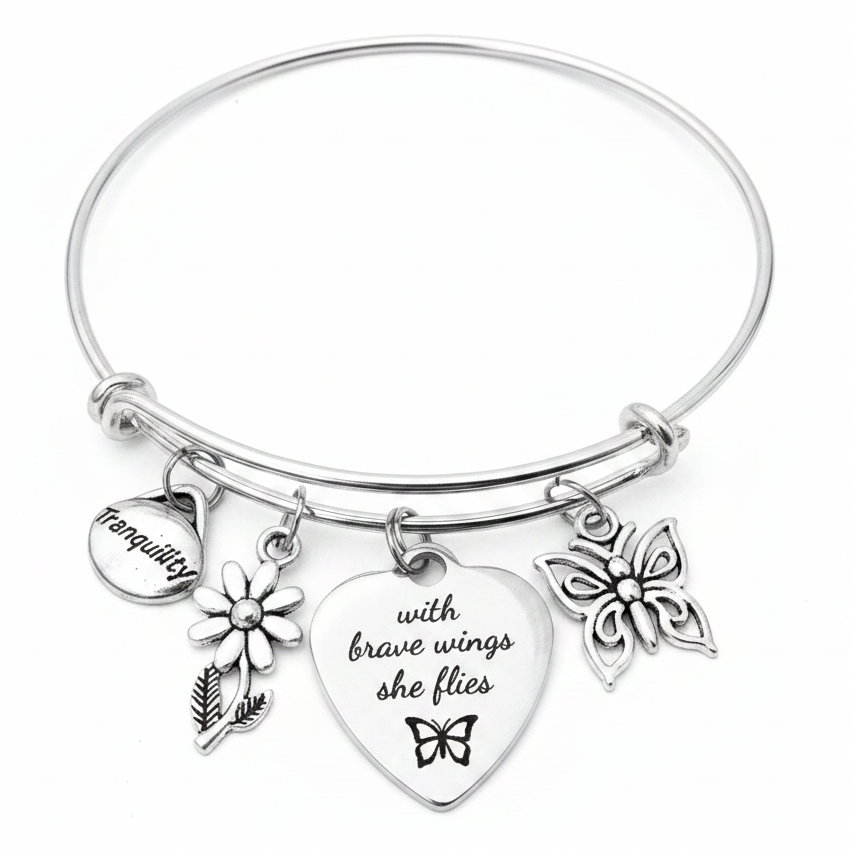 Silver expandable bangle bracelet with Tranquility coin charm, daisy flower charm, engraved heart charm reading &