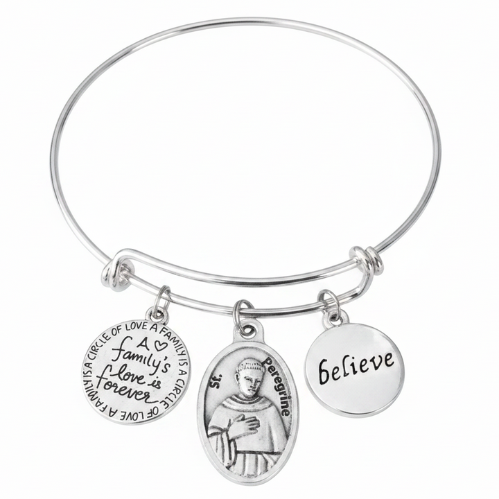 St. Peregrine silver expandable charm bracelet on white studio background — Catholic cancer patron saint gift