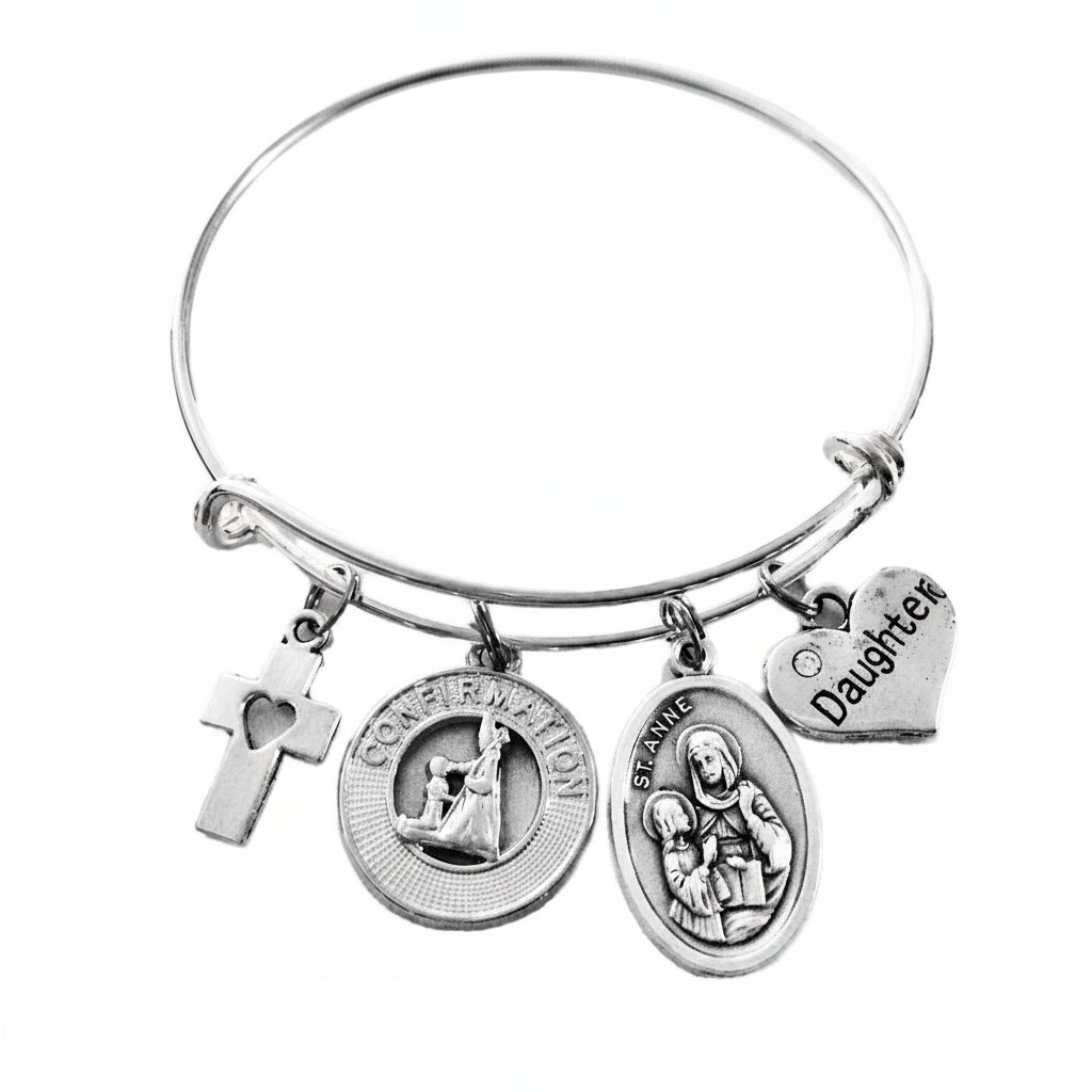 Silver expandable bangle bracelet with cross heart charm, Confirmation medallion, St. Anne saint medal, and Daughter heart charm on white background by Jules Obsession