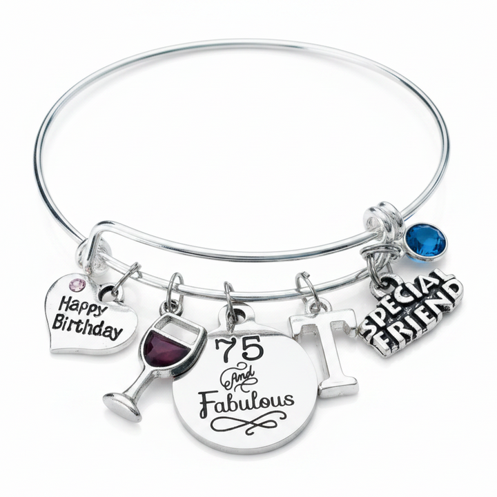 75 and Fabulous silver charm bangle bracelet with Happy Birthday heart charm, wine glass charm, personalized initial charm, Special Friend heart charm, and blue crystal birthstone — expandable bracelet gift for her 75th birthday