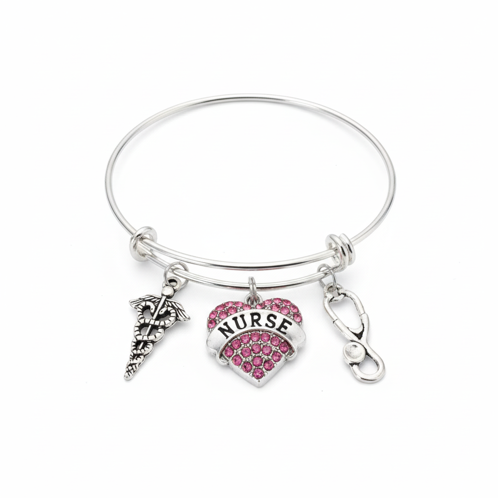 Silver expandable bangle bracelet with pink crystal nurse heart charm, stethoscope charm, and caduceus medical symbol charm on white background