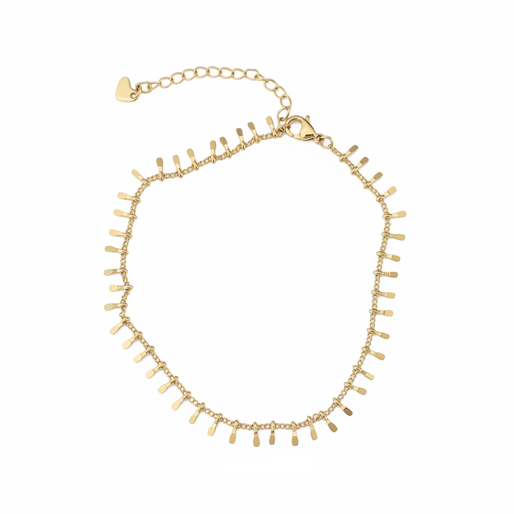Delicate gold anklet with small teardrop paddle charms dangling from a fine curb chain, lobster clasp closure with heart accent, studio white background