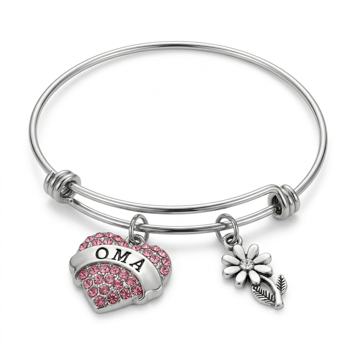 Stainless steel expandable bangle with a pink crystal OMA heart charm and silver-plated daisy flower charm on a white background.