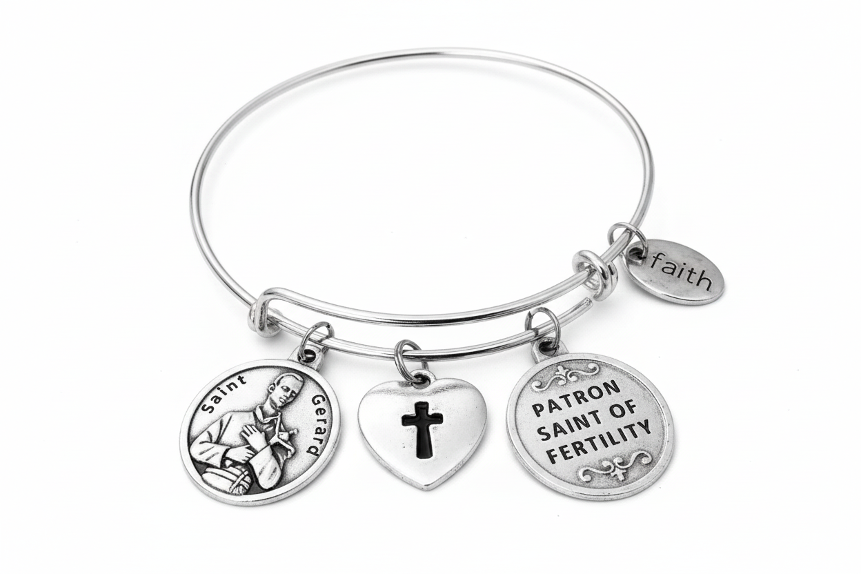 St Gerard fertility bracelet with patron saint medal, faith charm, and cross on white background