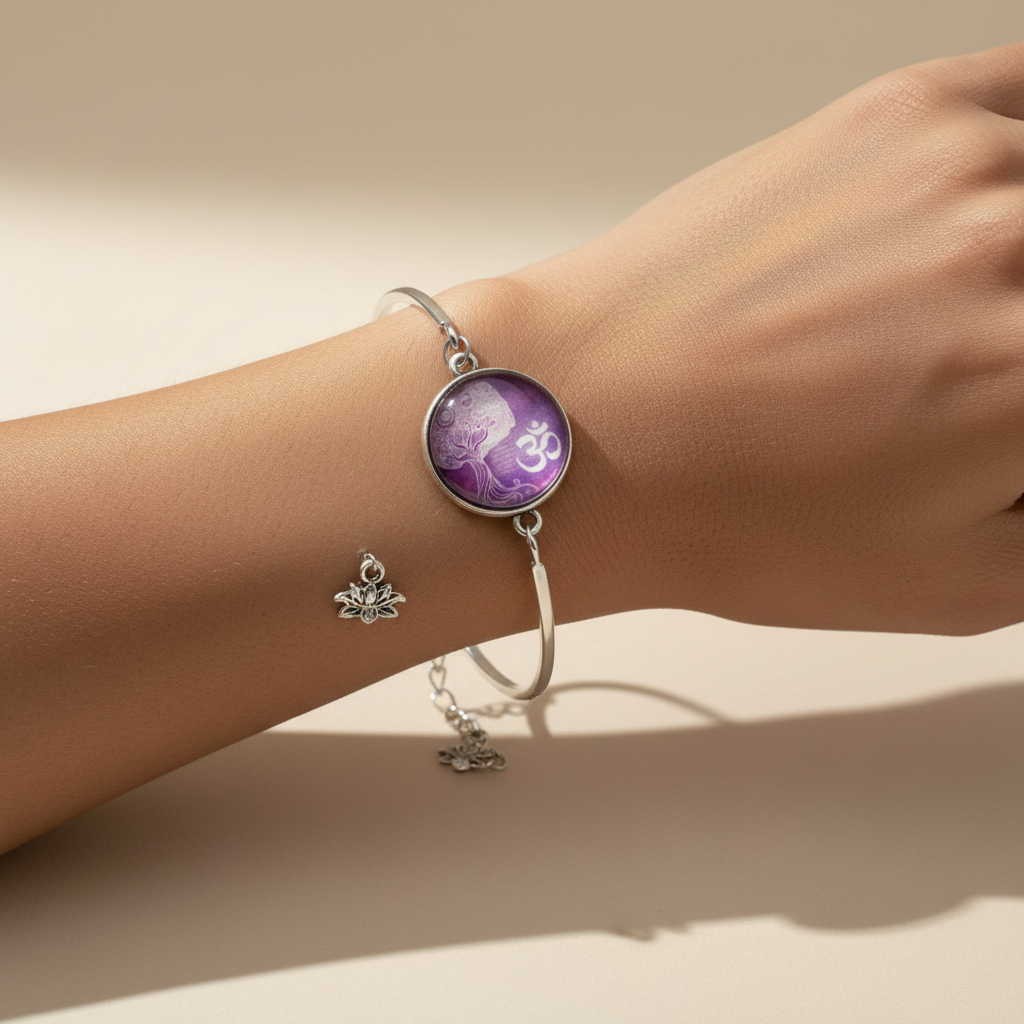 Woman wearing purple Tree of Life Om glass dome silver bangle bracelet with lotus charm – yoga spiritual jewelry by Jules Obsession