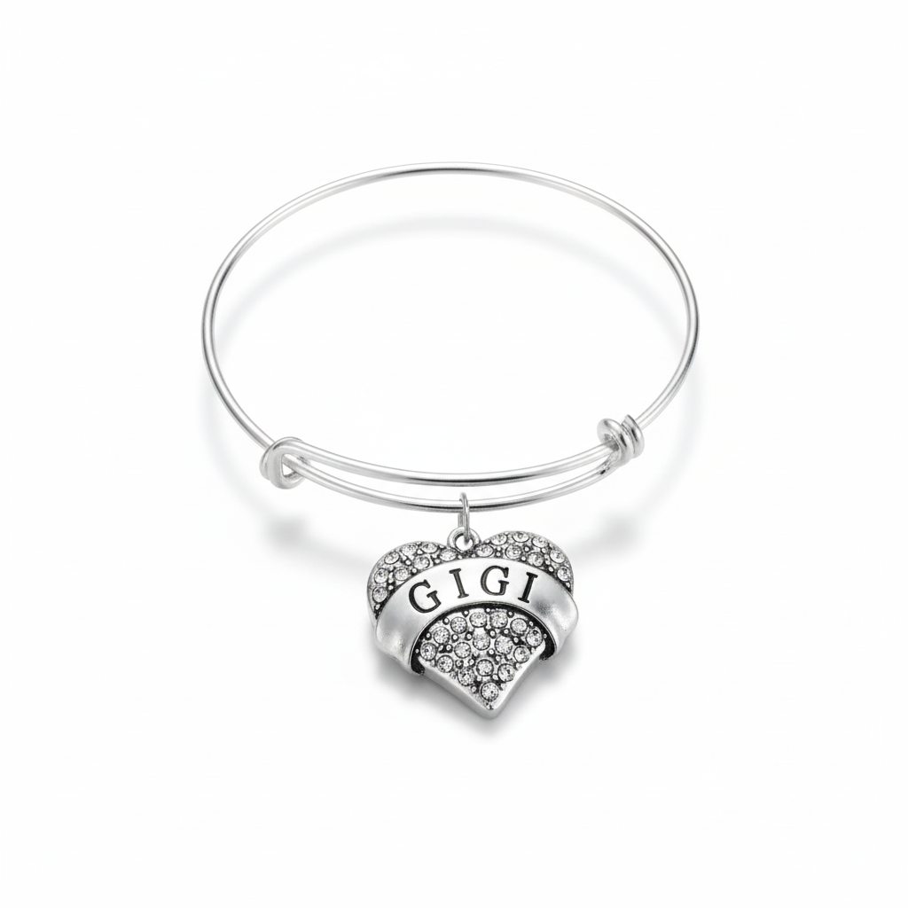 Silver expandable wire bangle bracelet with sparkling crystal rhinestone pave GIGI heart charm on white background – Jules Obsession