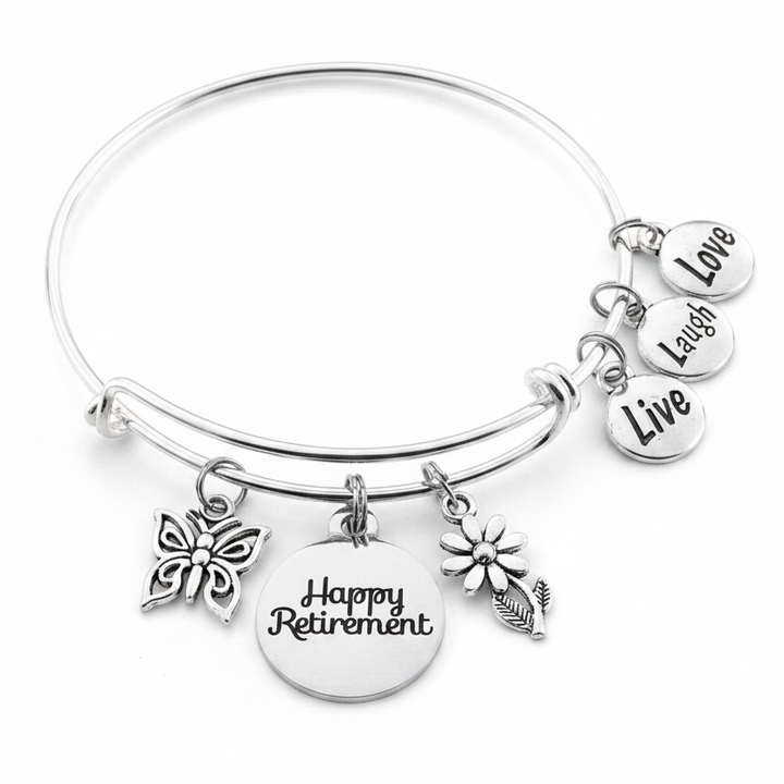 Silver expandable charm bracelet with Happy Retirement disc, butterfly, daisy flower and Live Laugh Love charms – adjustable bangle retirement gift for women by Jules Obsession

