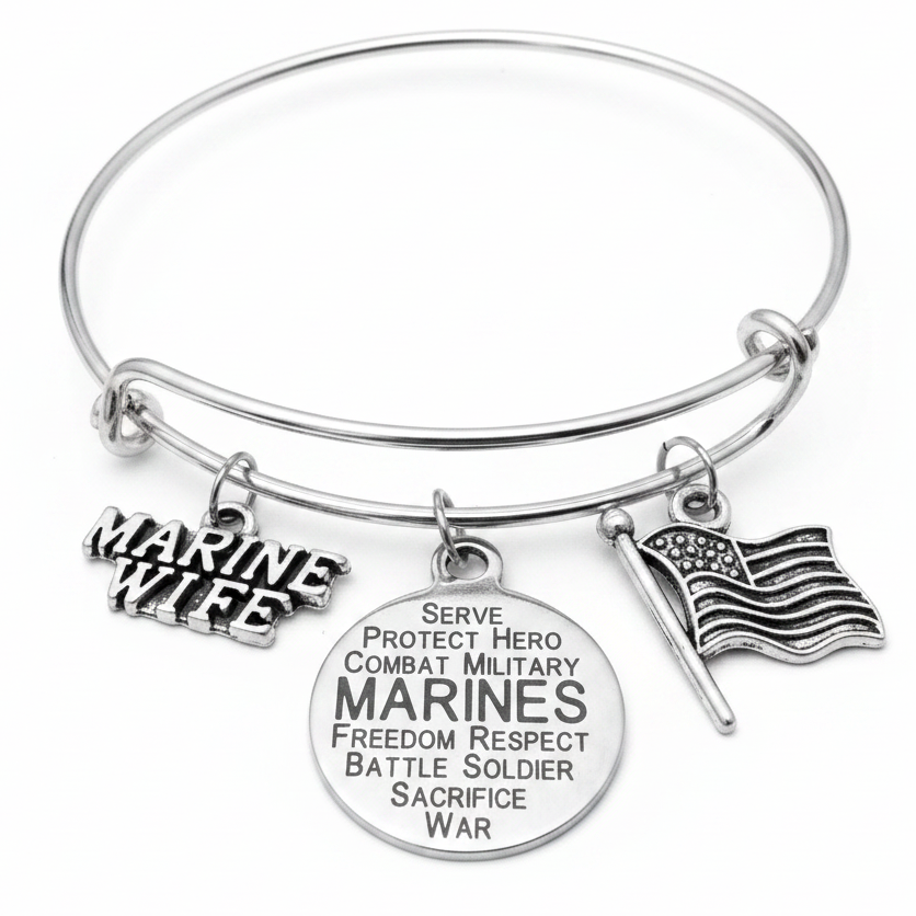 Marine Wife expandable silver charm bracelet featuring a Marine Wife text charm, Marines engraved word disc, and USA flag charm on a black background