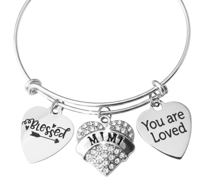 Silver bracelet with heart-shaped charms reading &