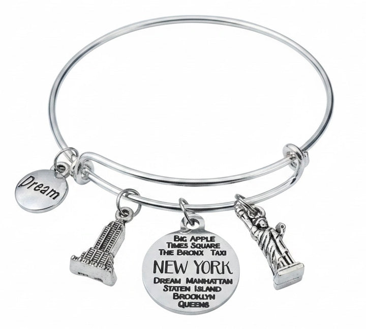 New York City Silver Charm Bangle Bracelet with Empire State Building, Statue of Liberty, NYC Landmark Disc, and Dream Charm

