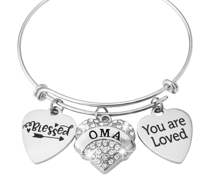 Silver bracelet with heart-shaped charms reading &