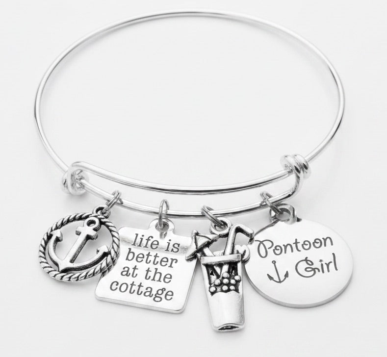 Pontoon Girl Life is Better at the Cottage silver expandable charm bracelet with anchor, cocktail, and engraved disc charms on adjustable bangle