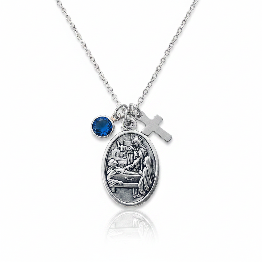 Saint Colette of Corbie silver oxidized medal necklace with faceted blue crystal birthstone charm and stainless steel cross charm on a delicate rope chain — patron saint of fertility, expectant mothers, and sick children