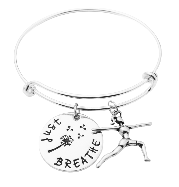 Silver expandable charm bracelet with a yoga dancer charm and round “JUST BREATHE” dandelion charm 