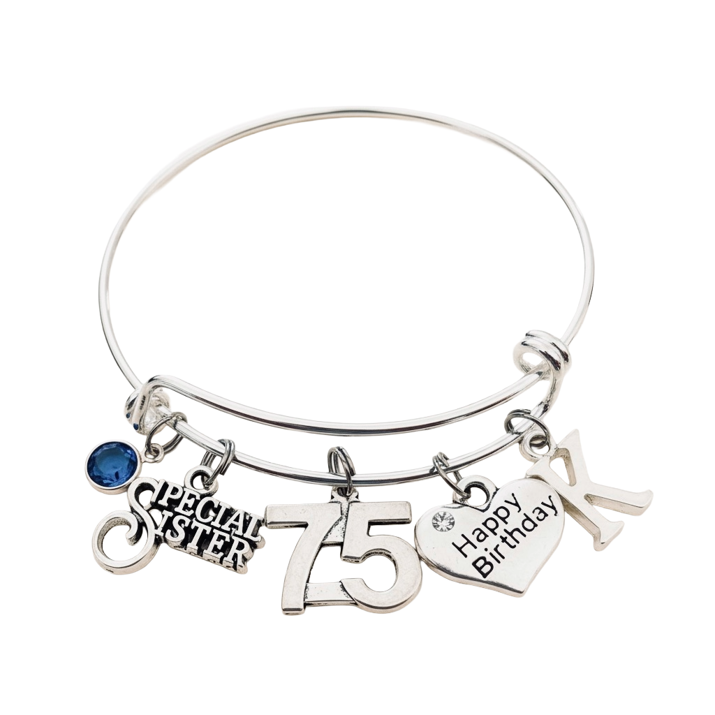 Silver expandable 75th birthday charm bracelet with blue birthstone charm, “SPECIAL SISTER” charm, 75 charm, “Happy Birthday” heart charm, and pale accent charm on a warm-white studio background.