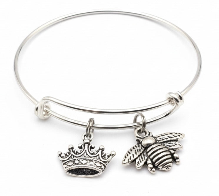 Silver expandable charm bangle bracelet with ornate filigree crown charm and detailed bumblebee charm with textured wings — Queen Bee gift bracelet for her by Jules Obsession