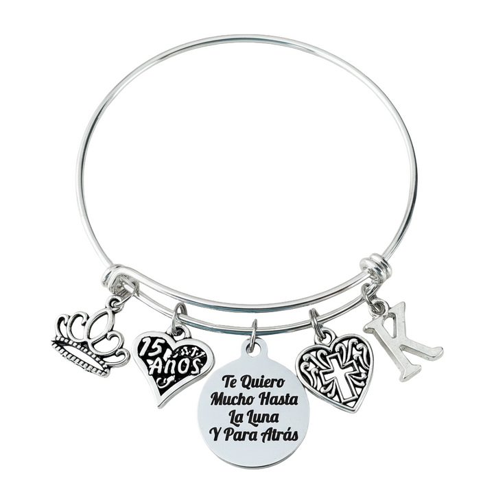 Silver expandable bangle bracelet with crown charm, 15 Años heart charm, Te Quiero Mucho Hasta La Luna e cross charm, and personalized initial charm — meaningful Quinceañera gift for girls
