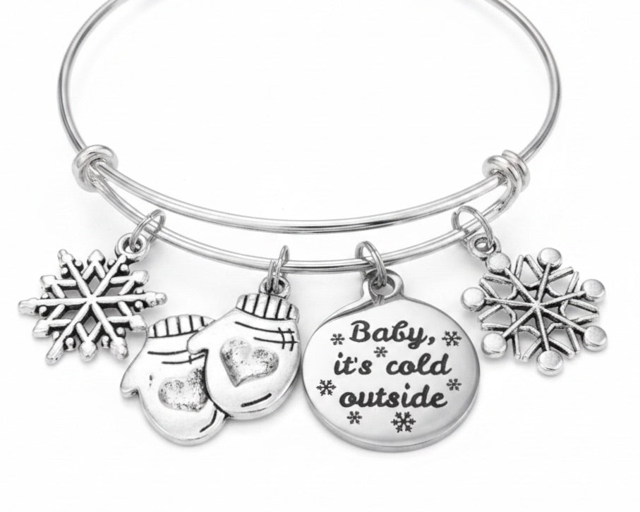 Silver expandable bangle with snowflake, mitten, and Baby It&