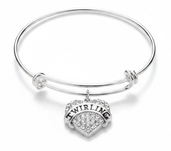 Silver expandable bangle bracelet with a clear crystal pave heart charm engraved Twirling
