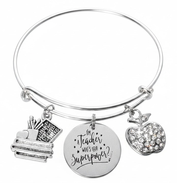 Silver charm bracelet with rhinestone apple, teaching supplies &amp; superpower quote disc — teacher appreciation gift