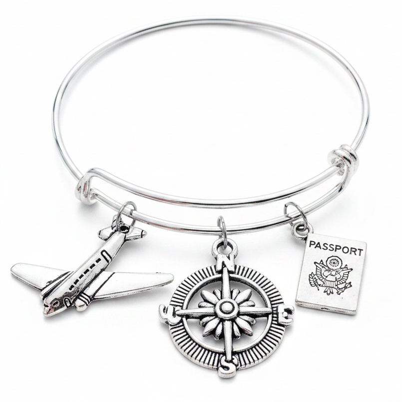 Silver expandable charm bracelet with airplane, compass rose and passport charms – adjustable bangle wanderlust and travel gift for women by Jules Obsession