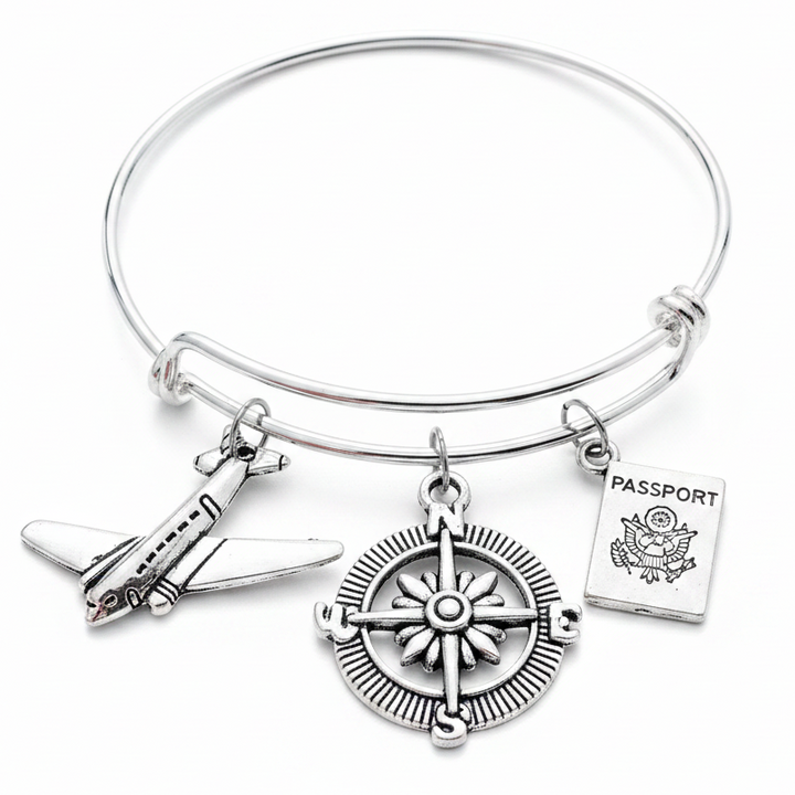 Silver expandable charm bracelet with airplane, compass rose and passport charms – adjustable bangle wanderlust and travel gift for women by Jules Obsession