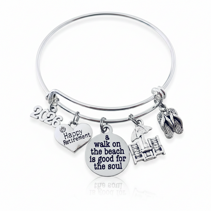  Silver expandable charm bangle with 2026 year charm, Happy Retirement heart, A Walk on the Beach is Good for the Soul disc, beach chair, umbrella and flip flop charms – retirement gift for women by Jules Obsession