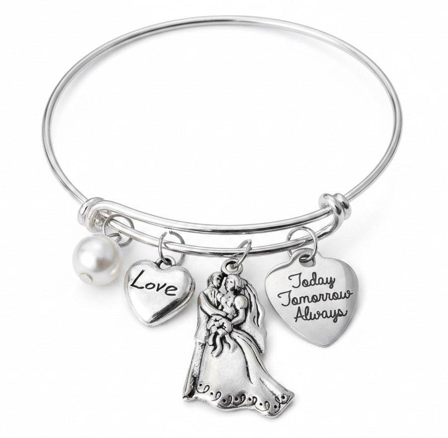 Silver expandable bangle bracelet with bride and groom couple charm, Love heart charm, Today Tomorrow Always heart charm, and white pearl bead — wedding gift jewelry by Jules Obsession

