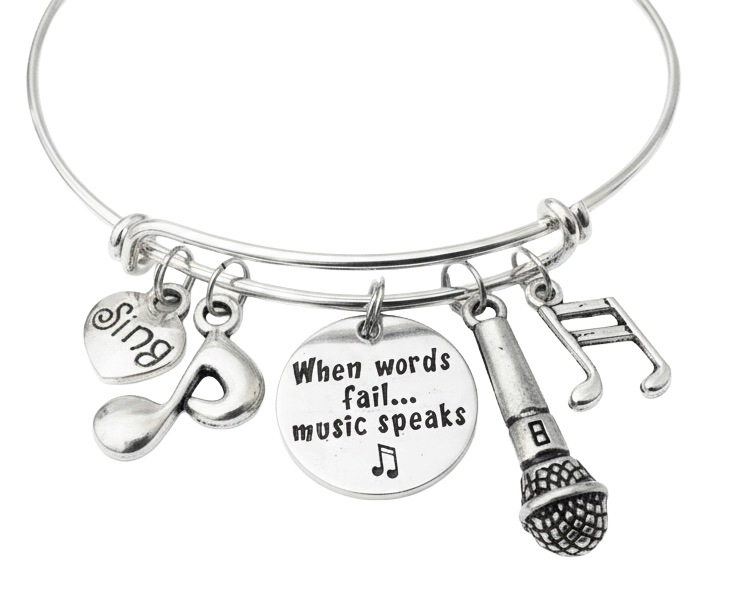 Silver expandable charm bangle bracelet with Sing heart charm, music note charm, When Words Fail Music Speaks engraved disc, microphone charm, and double music note charm — singer and musician gift bracelet by Jules Obsession