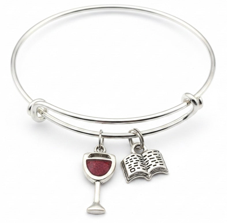Silver expandable bangle with red enamel wine glass charm and open book charm — gift bracelet for book lovers and wine enthusiasts