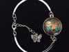 Butterfly Watch Glass Domed Charm on a Silver Adjustable Cuff Bracelet Bangle