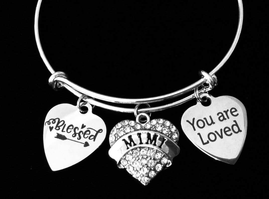 Expandable silver charm bracelet with “You Are Loved,” “Blessed,” and crystal heart charms for Mimi

