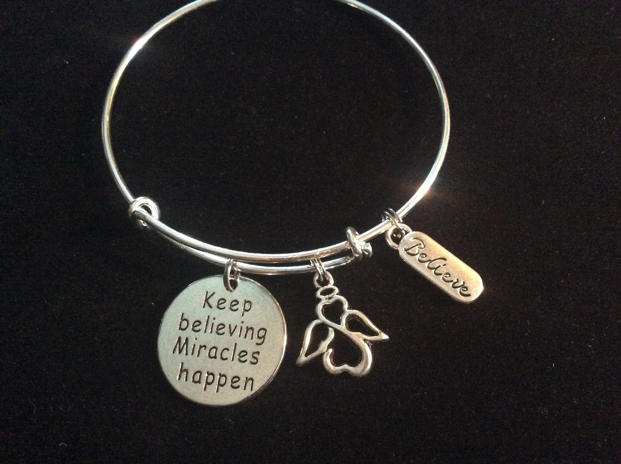 Keep Believing Miracles Happen Angel Charm on a Silver Adjustable Expandable Bangle