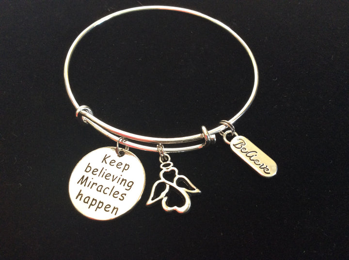Keep Believing Miracles Happen Angel Charm on a Silver Adjustable Expandable Bangle