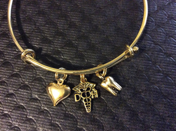 Dental Hygenist Gold Bangle with Gold Puffy Heart and Gold Tooth charm